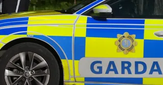 Woman dies and child injured in collision between car and truck